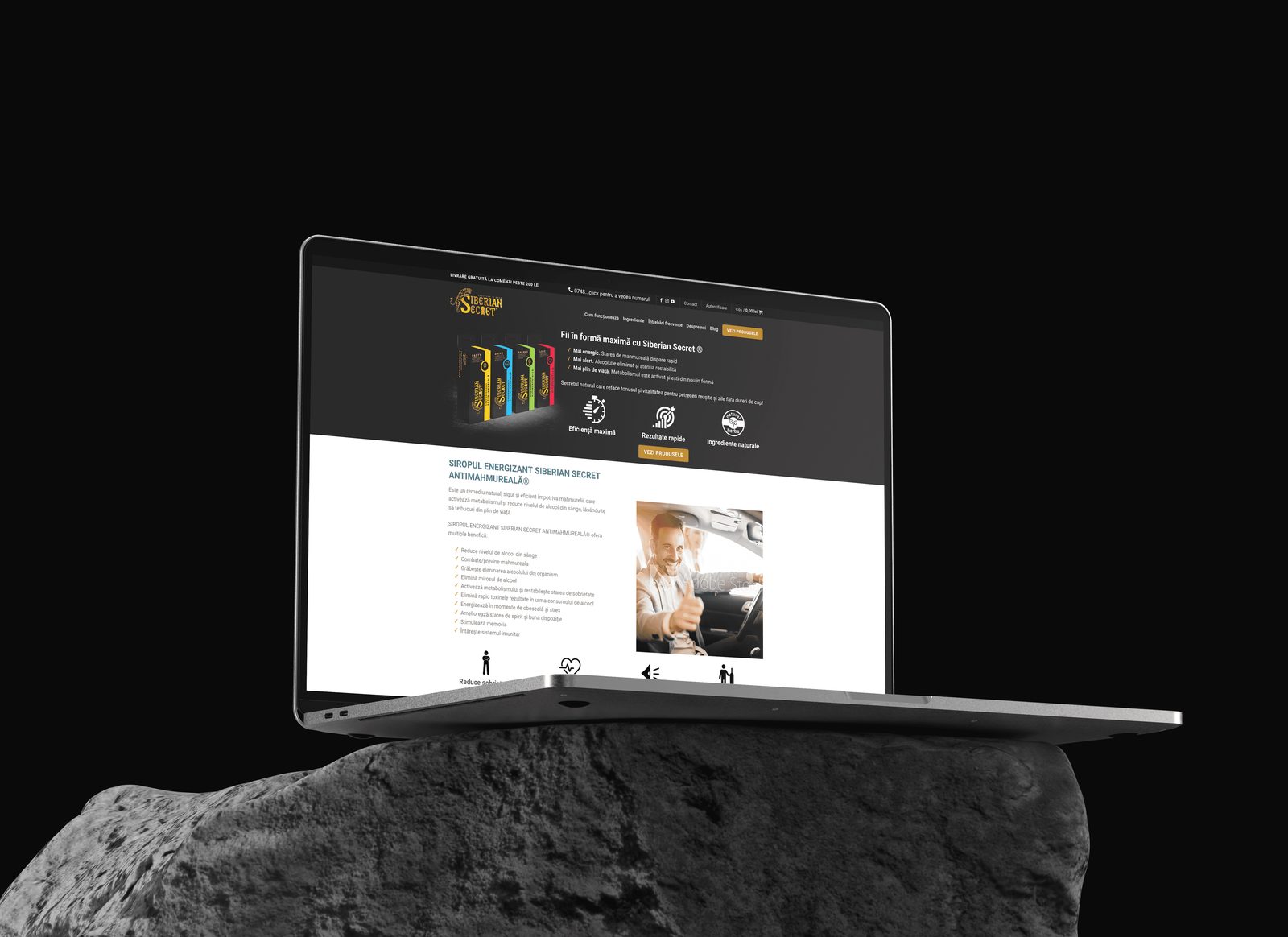 Un laptop pe o stâncă, cu landing page-ul Siberian Secret